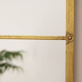Gold industrial arched full length metal mirror detail shot of side