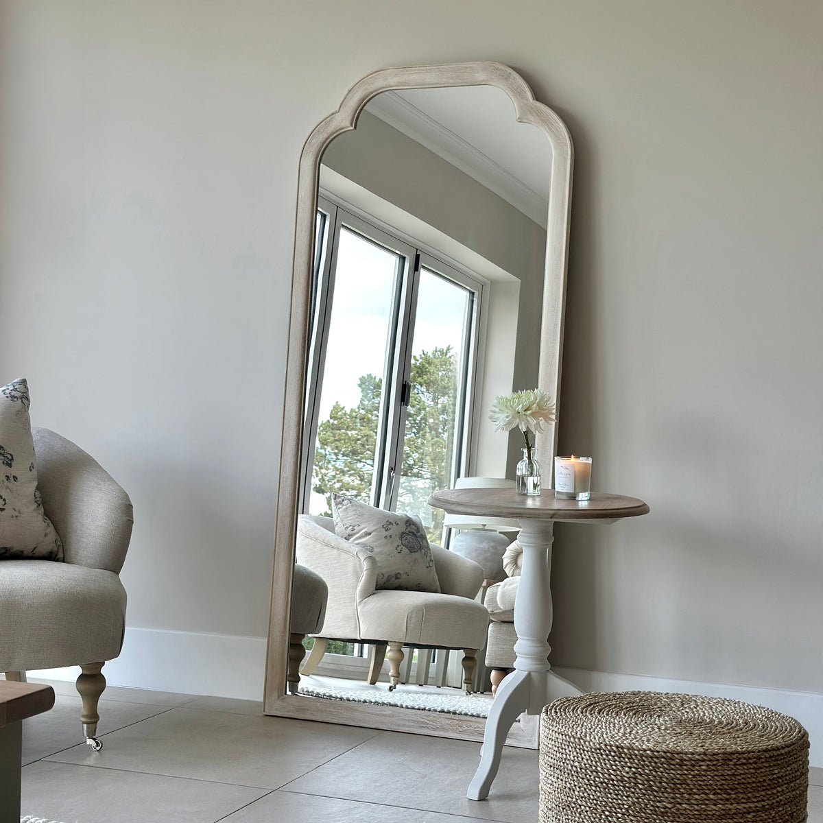 Full Length White Washed Wood Arched Mirror in living room