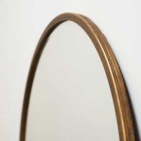 Gold Metal Modern Round Wall Mirror detail shot of curved frame