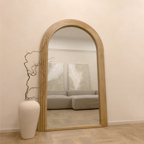 Full Length Arched Washed Wood Mirror in lounge opposite sofa