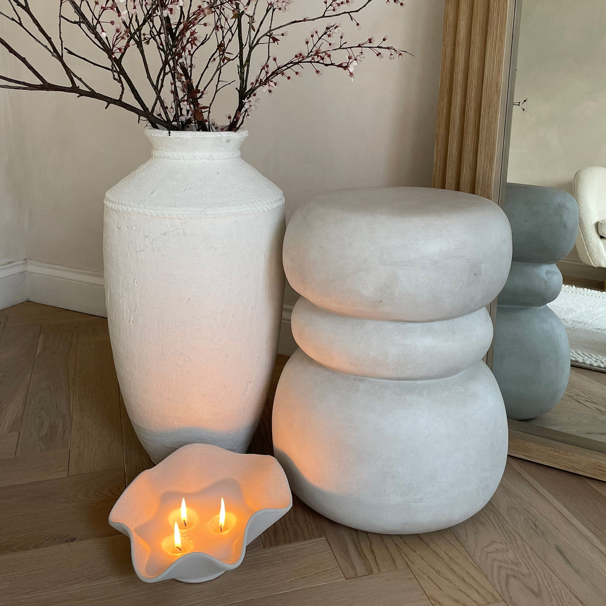 Minimal Concrete Side Table beside vase and candles