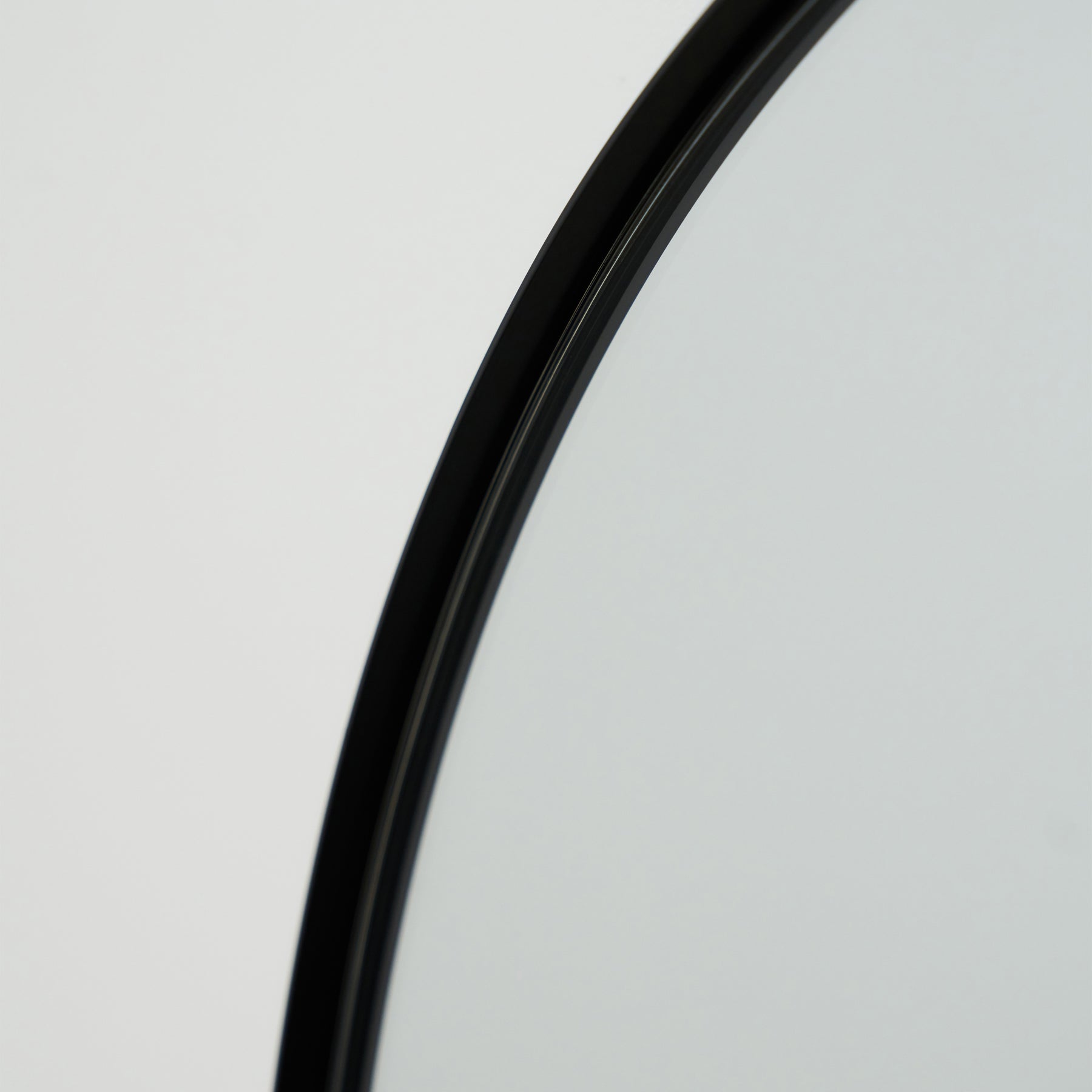 Detail shot of Full Length Black Arched Large Metal Mirror curved frame