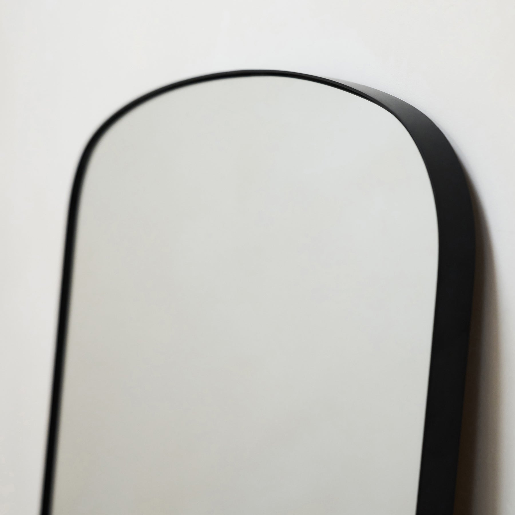 Bowness - Black Contemporary Arched Metal Wall Mirror 90cm x 75cm