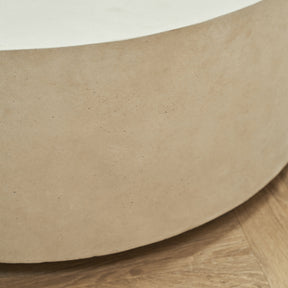 Closeup of Large minimalist concrete round coffee table