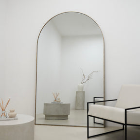 Champagne Full Length Arched Metal Mirror as living room lean to