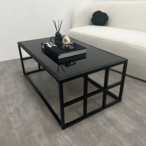 Black modern large rectangle tinted mirrored coffee table in living room