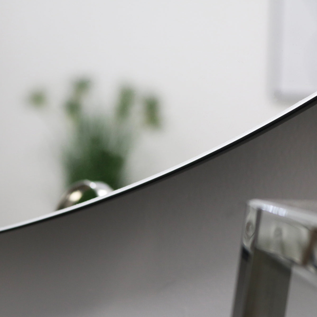 Small Frameless Round Wall Mirror detail shot of curve