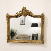 Gold Arched Ornate Overmantle Wall Mirror on living room wall