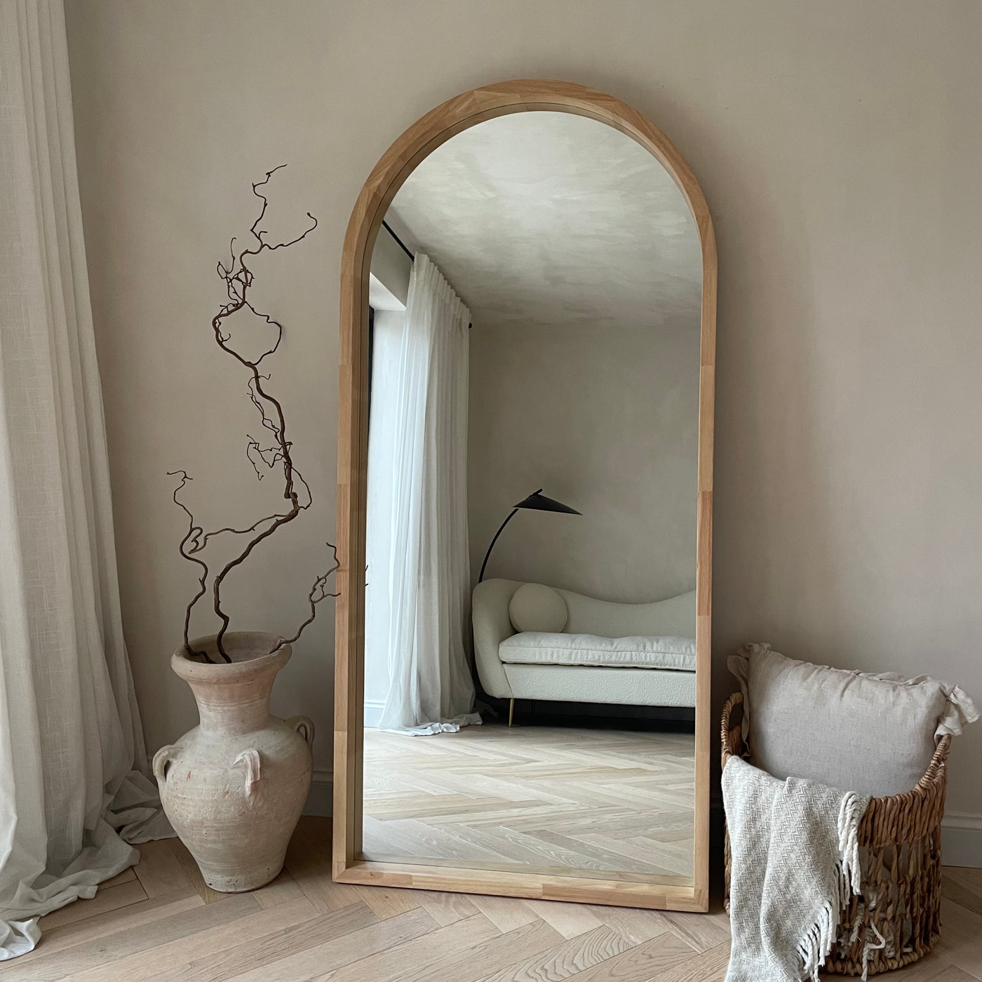 Natural Organic Full Length Wooden Arched Mirror leaning against wall