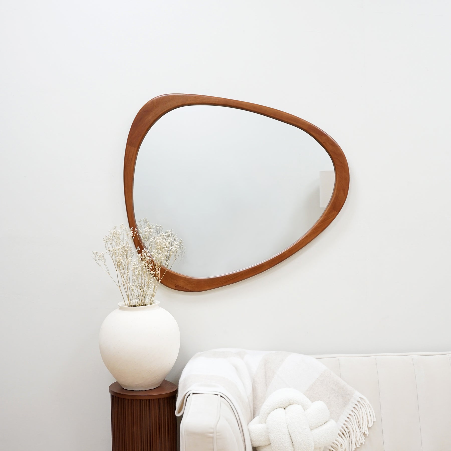 Walnut Organic Irregular Wooden Wall Mirror displayed horizontally on wall
