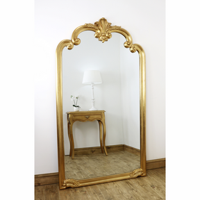 An overall view of this highly decorative mirror in a typical setting.